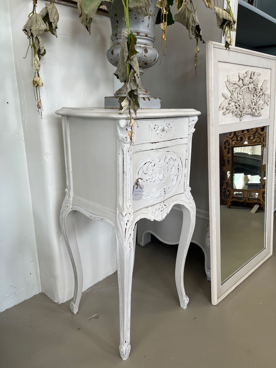 French antique Bedside with carved front.