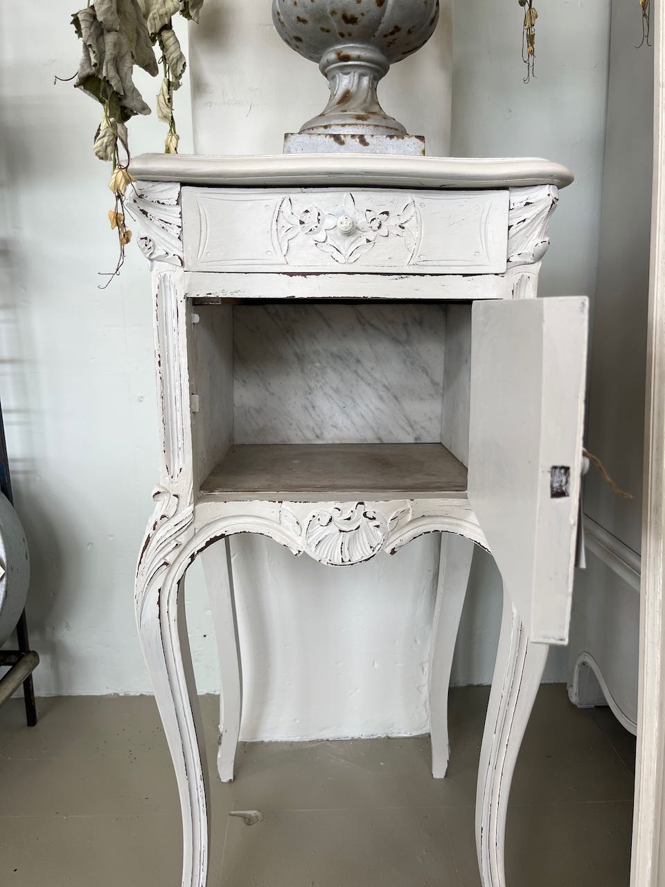 French antique Bedside with carved front.